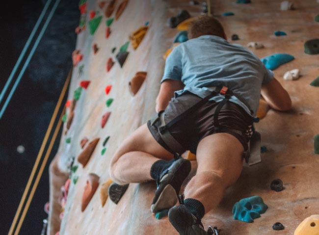 Indoor rock climbing at A-Lodge in Boulder, Colorado