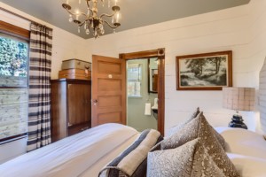 Queen bedroom in Lyon's A-Lodge vacation home rental