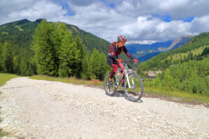 Woman gravel biking in the Sangre de Cristo mountains of Colorado