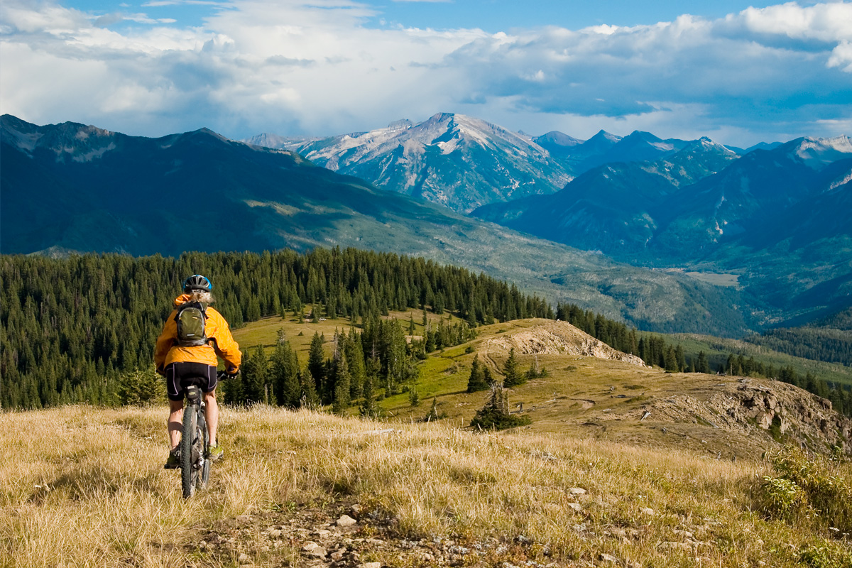 Woman mountain biking the Monarch Crest trail in Colorado