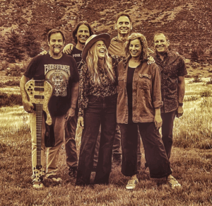 Picture of a band playing at the Rock Garden beer garden and music venue in Lyons Colorado in the A-Lodge