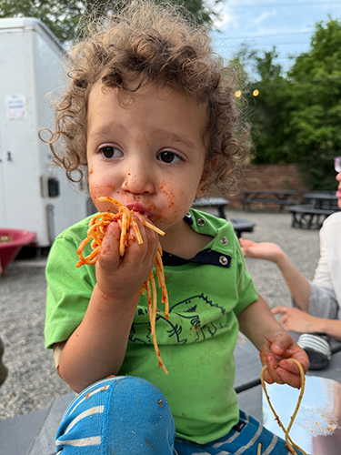 Child eating at the Rock Garden Grill in Lyons Colorado