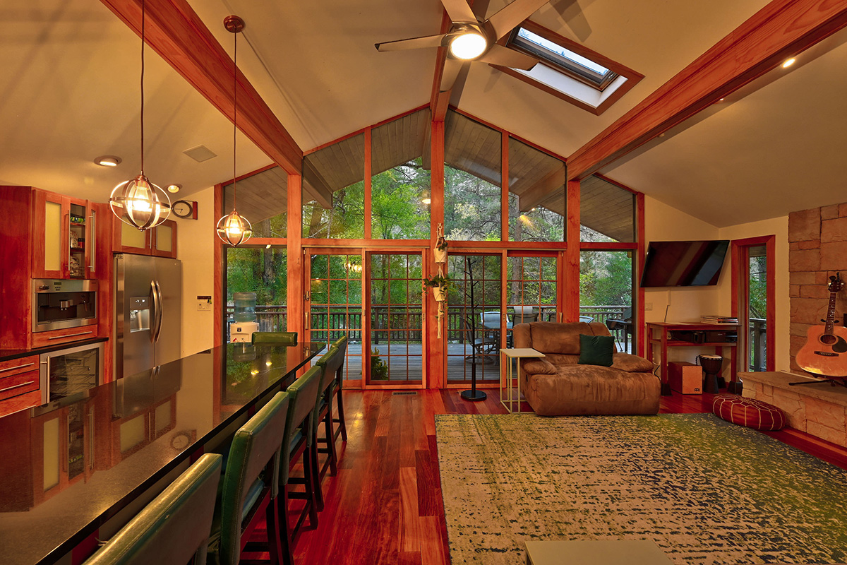 Family room at dusk in the A-Chalet on the grounds of the A-Lodge hotel in Boulder