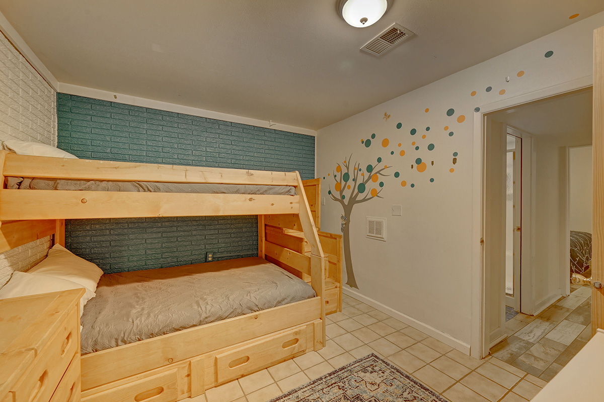Kids bedroom with bunk beds in the A-Chalet home for rent near Boulder, CO