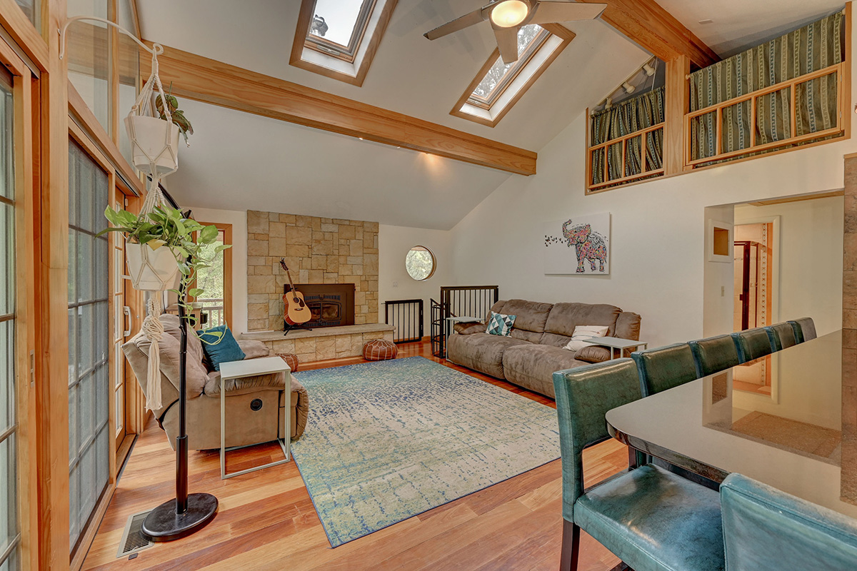 Fireplace in the family room of the A-Chalet home rental in Boulder