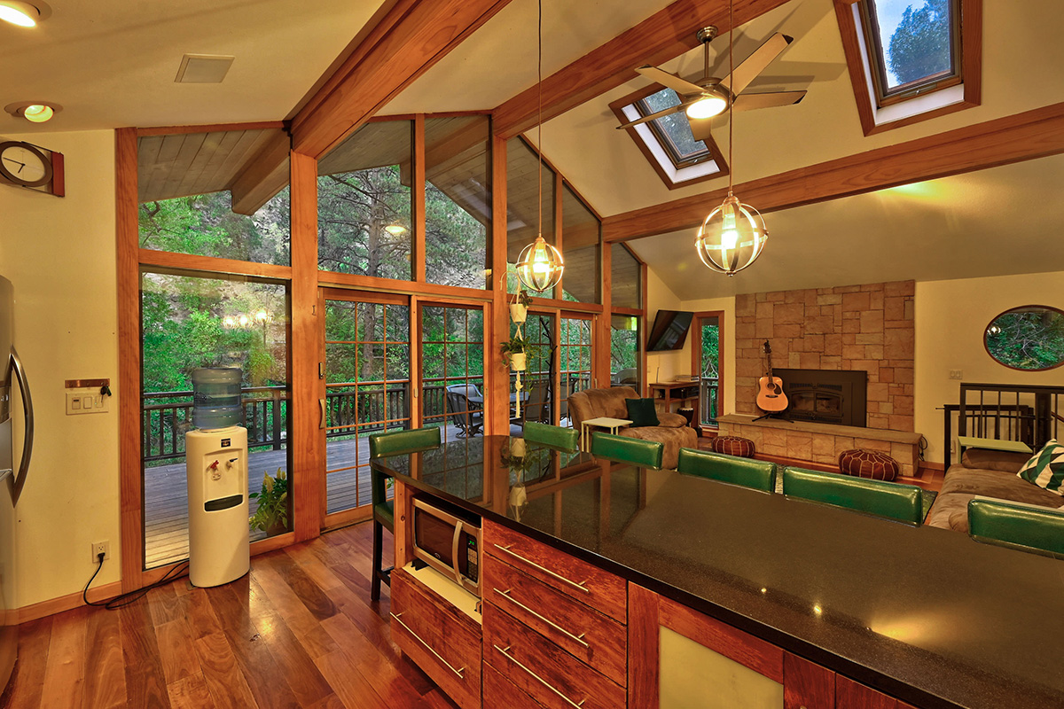 View from Kitchen at dusk in the A-Chalet house rental in Boulder