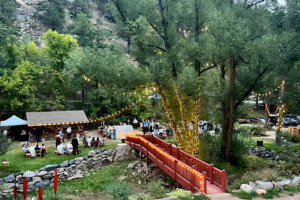 Destination wedding reception at A-Lodge Boulder Colorado with creekside ceremony and mountain canyon setting