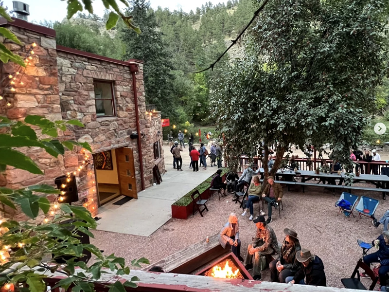 rock climber hanging around the beer garden at the A-Lodge in Boulder